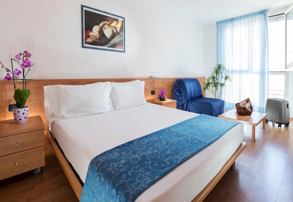 Aparthotel Esperya Lignano Sabbiadoro Bilik gambar